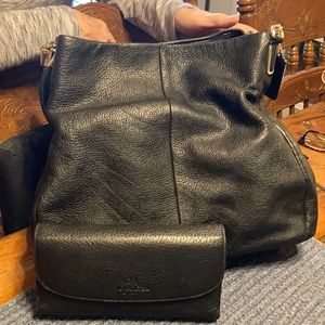 Coach shoulder bag with wallet.